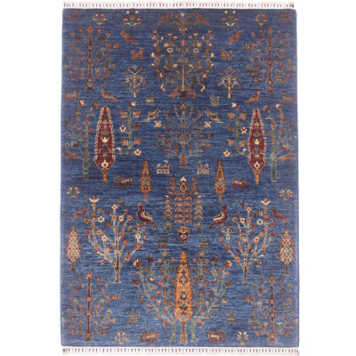 Pictorial blue Loribaft Rug with design of trees, birds and wandering elks.