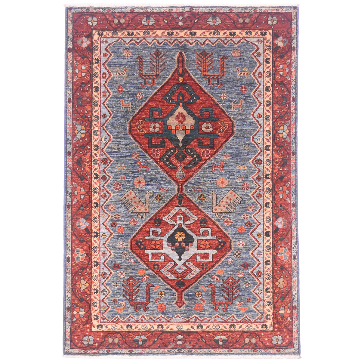 Handmade Qashqai design rug with double medallion design on a light denim blue field with rust-red medallions & border.
