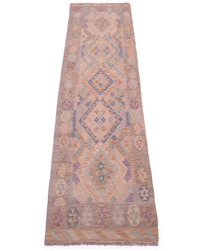 A 9'2 long rectangular Soft colour Kilim runner with a geometric pattern in muted beige, dusty blue, and lavender purple, shown flat against a white background.