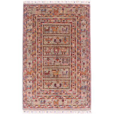 Greeny-grey colour handmade Afghan Samarkand rug with ladder style design containing panels of plant and animal tribal motifs.