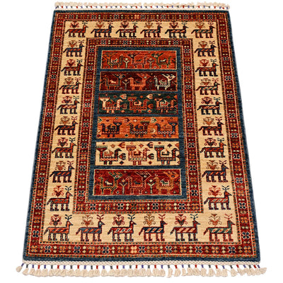 Full front view small rug with red border, cream field, and blue-centered design
