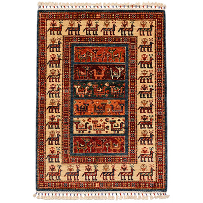 Full view small rug with red and blue border, cream background, and central medallion