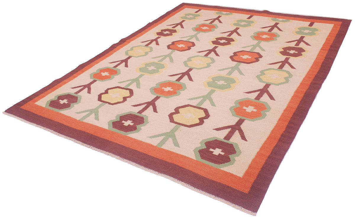 A rectangular Scandinavian style Kilim area rug with a retro mid-century modern pattern, featuring stylised flowers and leaves in orange, green, and cream on a beige background, with a wide plain orange and brown border.
