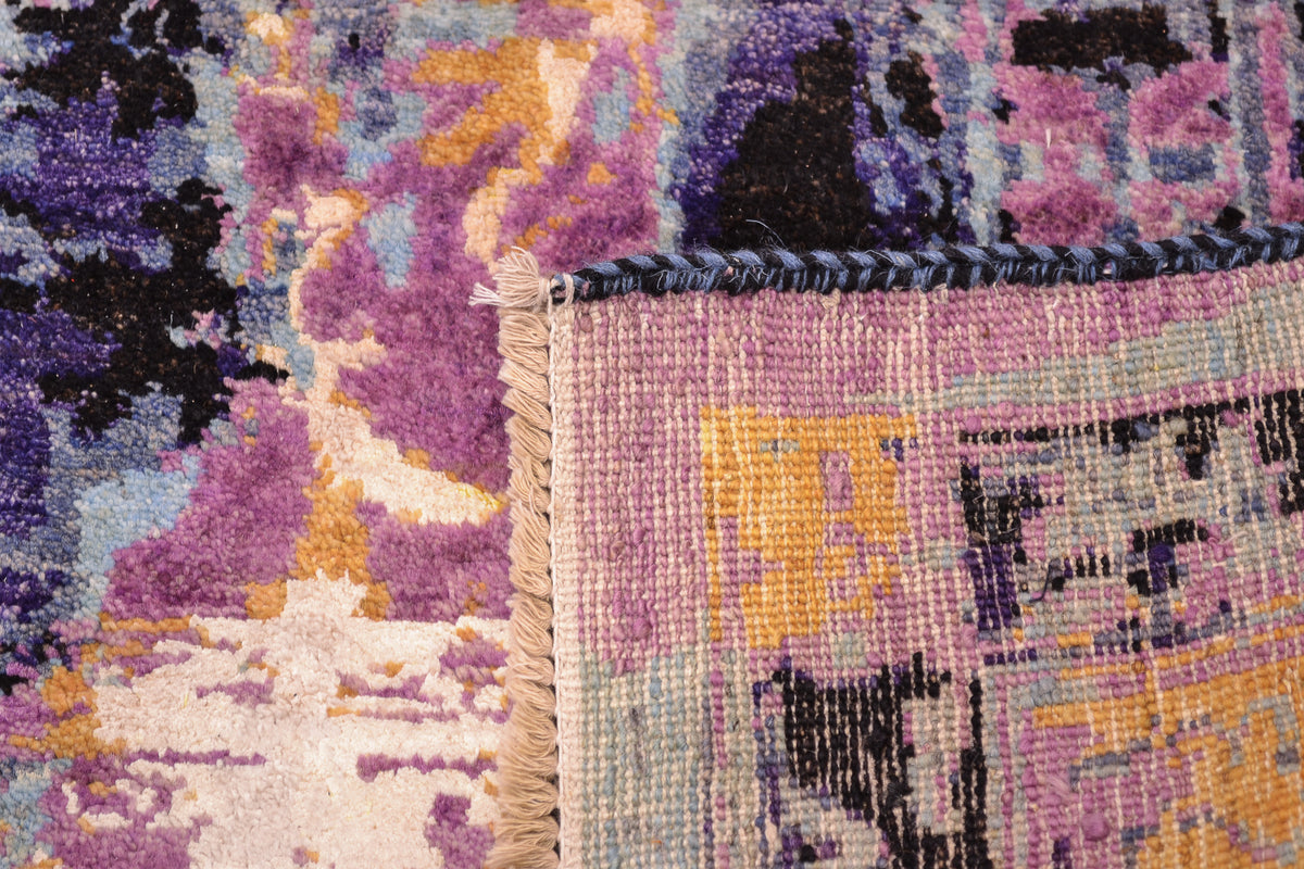Hand-knotted weave detail from modern abstract design Seismic .Back of carpet showing knots and cotton wefts. Art silk and wool pile.