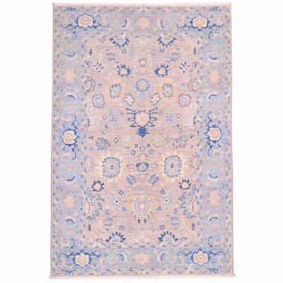 Afghan Serapi rug with super soft pastel colours, floral design on a grey field with soft blue border. All over floral motifs