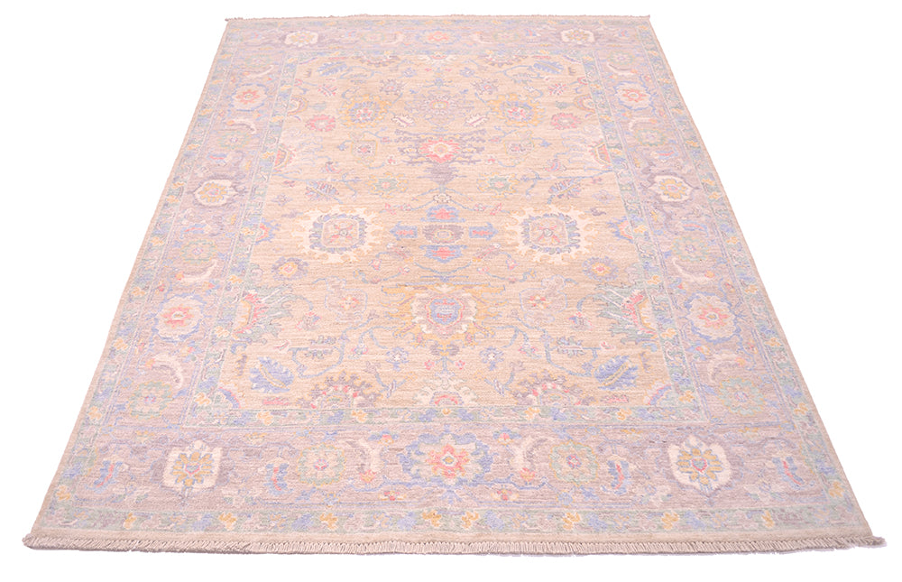 Antique Serapi style design Afghan Rug with variety of sot hues of cream, blue, coral pink and pale gold beige. Made with handspun wool with natural vegetable dyes.
