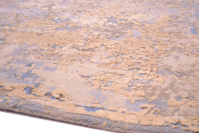 Detail of Indina carept with fine knotting of pure wool pileand substantial areas of pure handspun silk in golden creams and golden beiges.