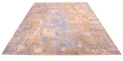 Overall view angled of impressive indian handknotted carept in light blue, light grey, and ivory cream. Silk highlight that are cut by hand in goldne beiges and grey slivers. Nuanced pastel tones blended tonalities.