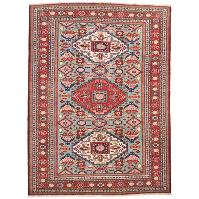 Caucasian Vintage Shirvan rug with geometric design; peppermint main colour with red and cream.