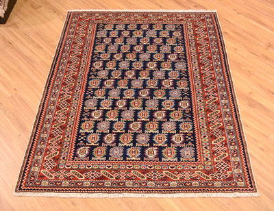 Fine handmade Afghan Shirvan Rug with all over flaming boteh design on a dark blue field (rather like Marasali Rugs).