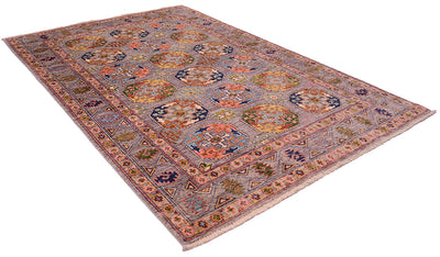 Angled view of fil pai rug with ersari fil pai design with a soft grey field with colourful geometric features and stylized geometric border.
