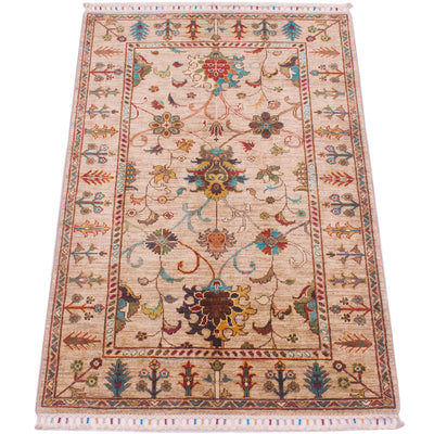 Traditional design handmade Afghan Sultani rug with beige field with all over floral design with modern colours and network of connecting flowerheads and sectioned flowers.