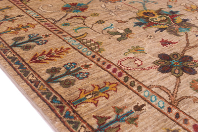 Detail of border of Sultani handmade tug with stylized plants and botanics in the  main border and contrasting geometriv  patterns in the minor borders. Connected floral motifs in the mian field.