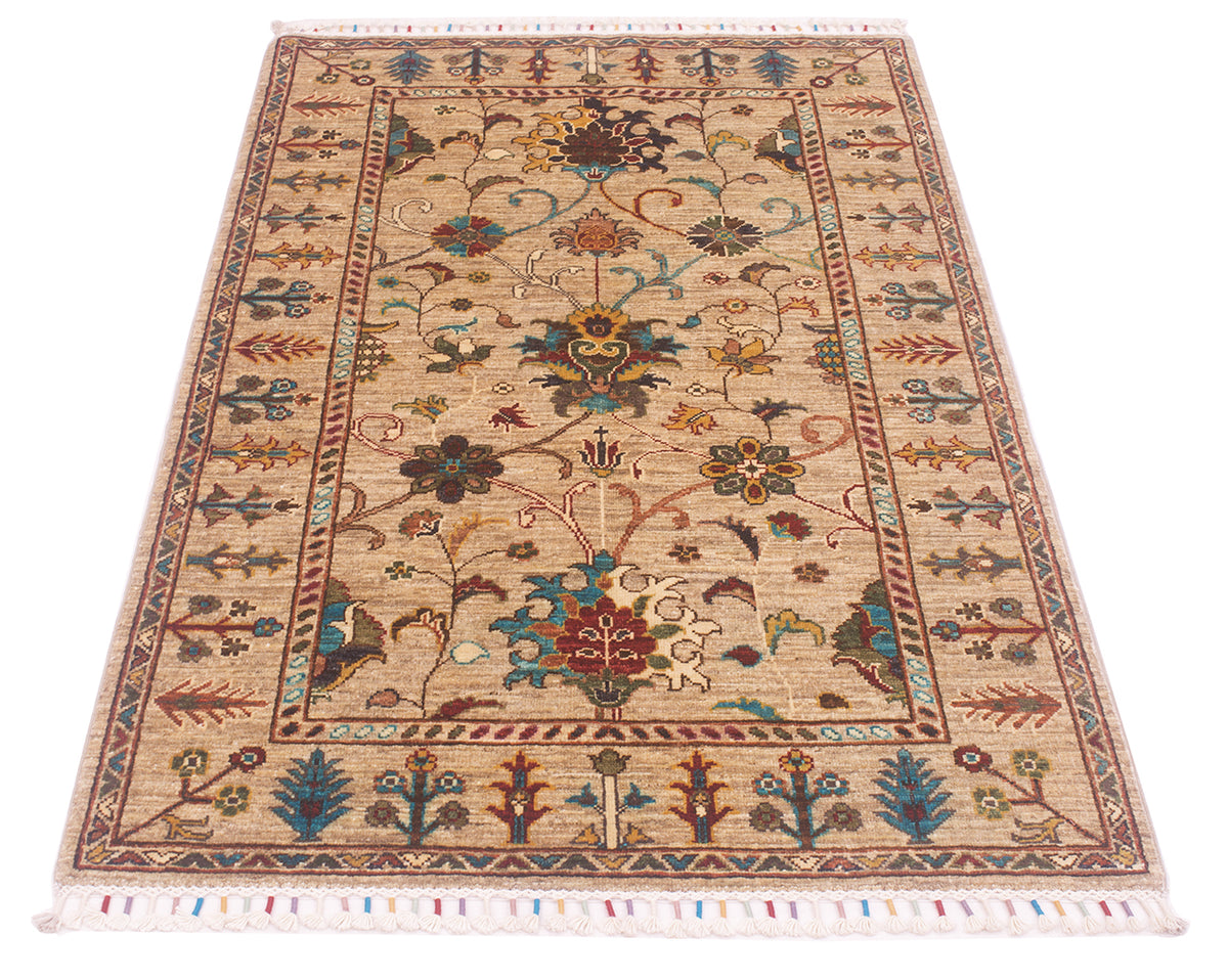 Persian design in all over floral field of afghan handmade rug with pure wool pile and golden beige field hues with contrasting colourful detailing and unfurling vines and stems connecting the botanical features.