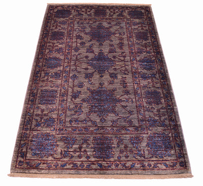 Persian floral design Afghan Rug wih rich blue and grey colourations delineated outlines. Wide spacious border and three central floral motifs in main field.