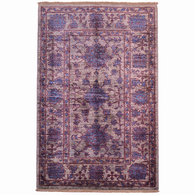 Afghan Sultani rug with stunning colours including a light pewter grey background with blue floral design outlined in red.