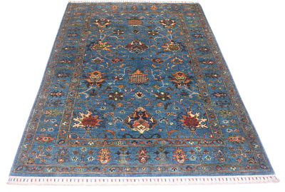 Rich coloration of blue and multicoloured Afghan sultani rug with contrasting colours in an all over floral design.