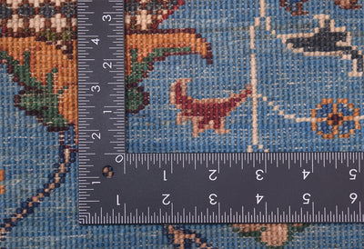 Detail of back of rug showing knotting of blue handmade sultani rug with natural vegetable dyes. 