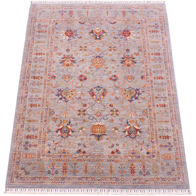 Stunning view of handknotted carpet with detailing in multiple colours with palmettes and pomegranates. Handwoven with natural vegetable dyes.