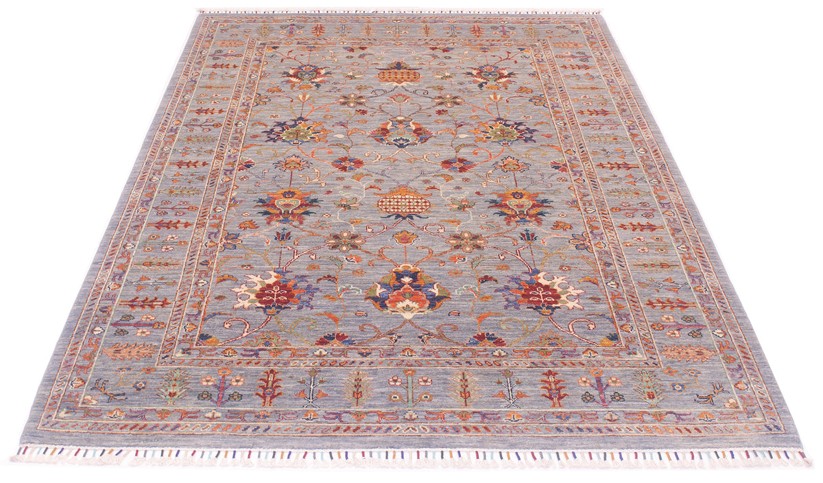 Elegant hadnwoven carpet made with handspun wool from Afghanistan. All over floral desgin in historical Shah Abbas style.