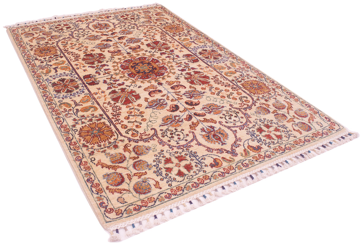 Handmade rug laid flat; cream field with red, blue and orange ornamental pattern