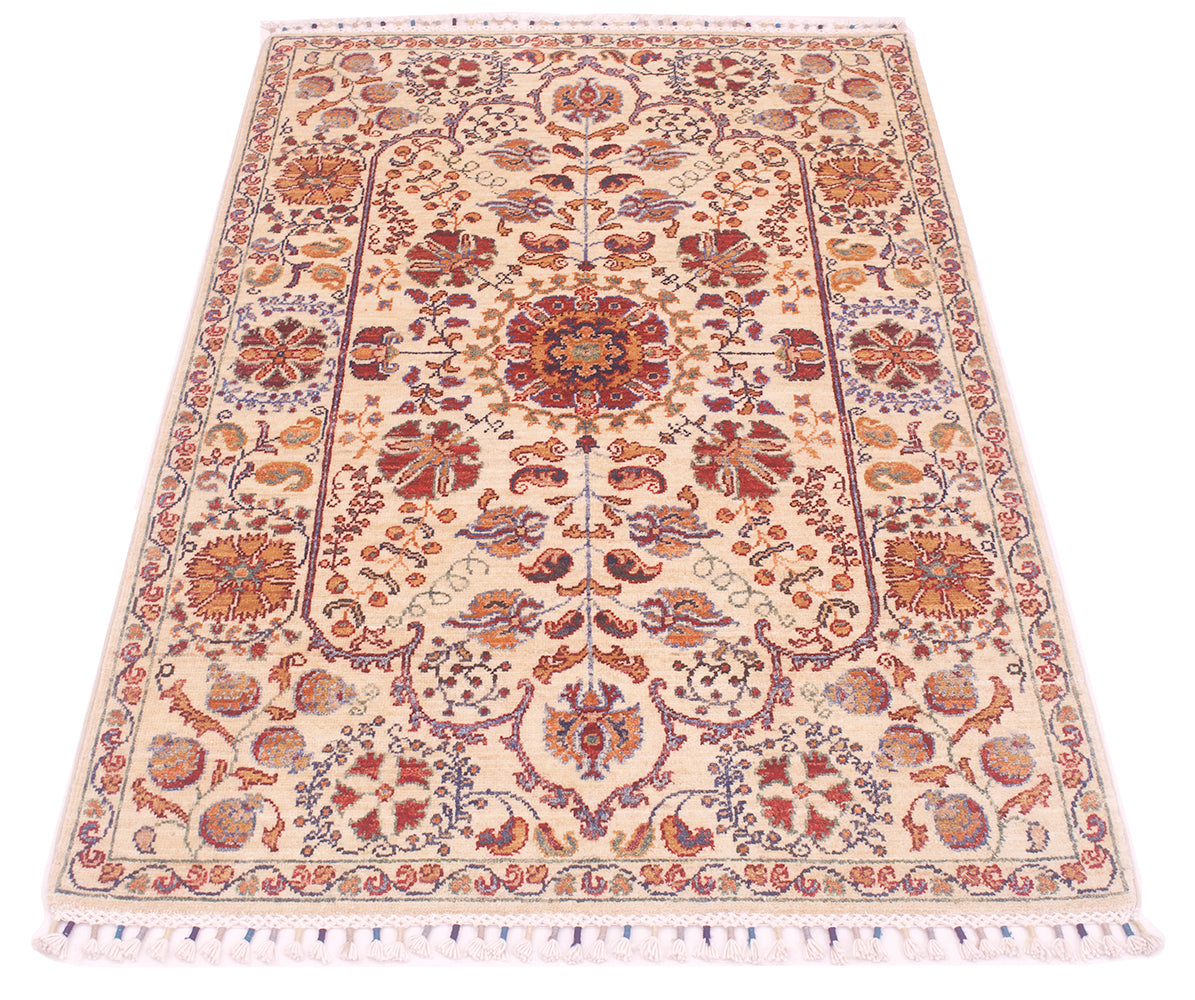 Cream Afghan rug with symmetrical red, blue and orange medallion design and short fringe