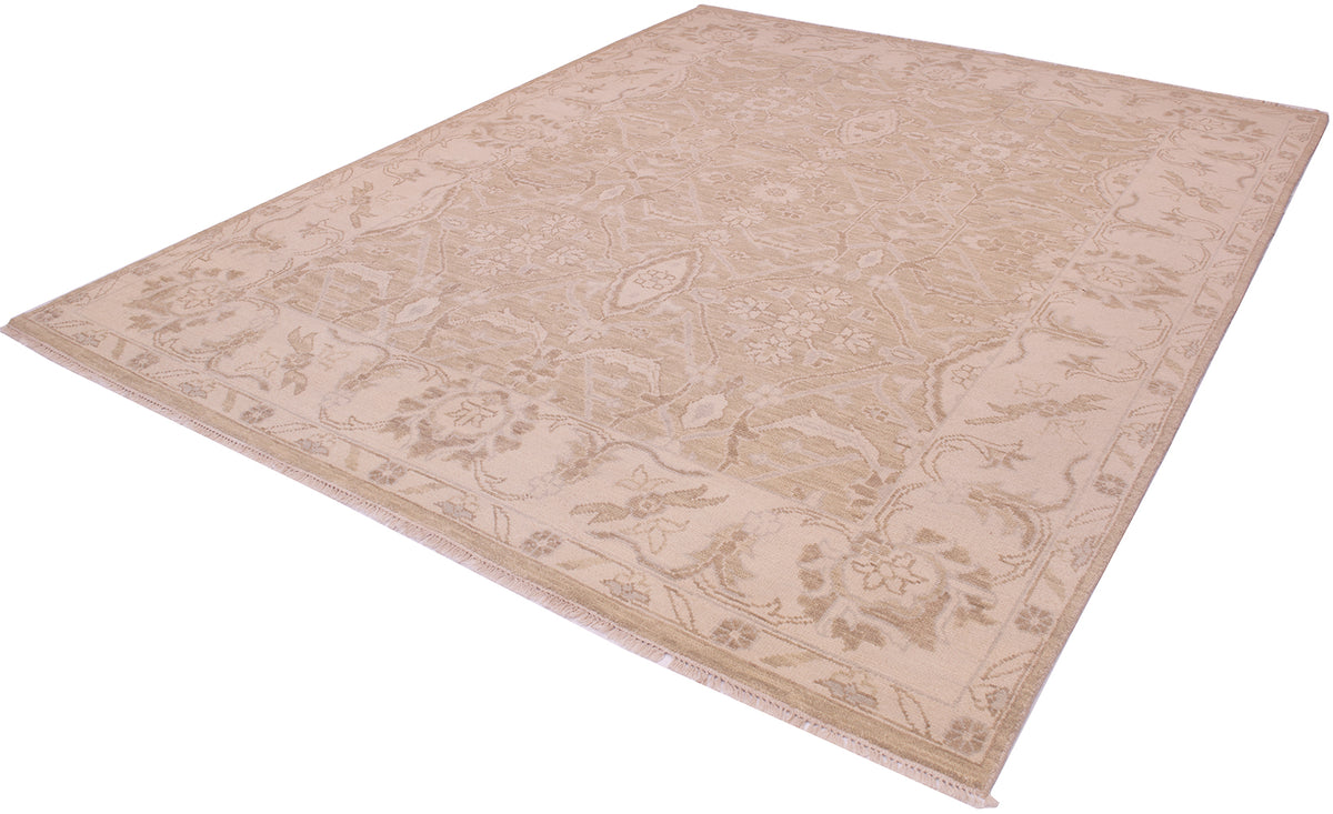 A rectangular tonal area rug with a traditional floral and vine pattern in shades of beige and light brown, shown from an elevated perspective against a white background.