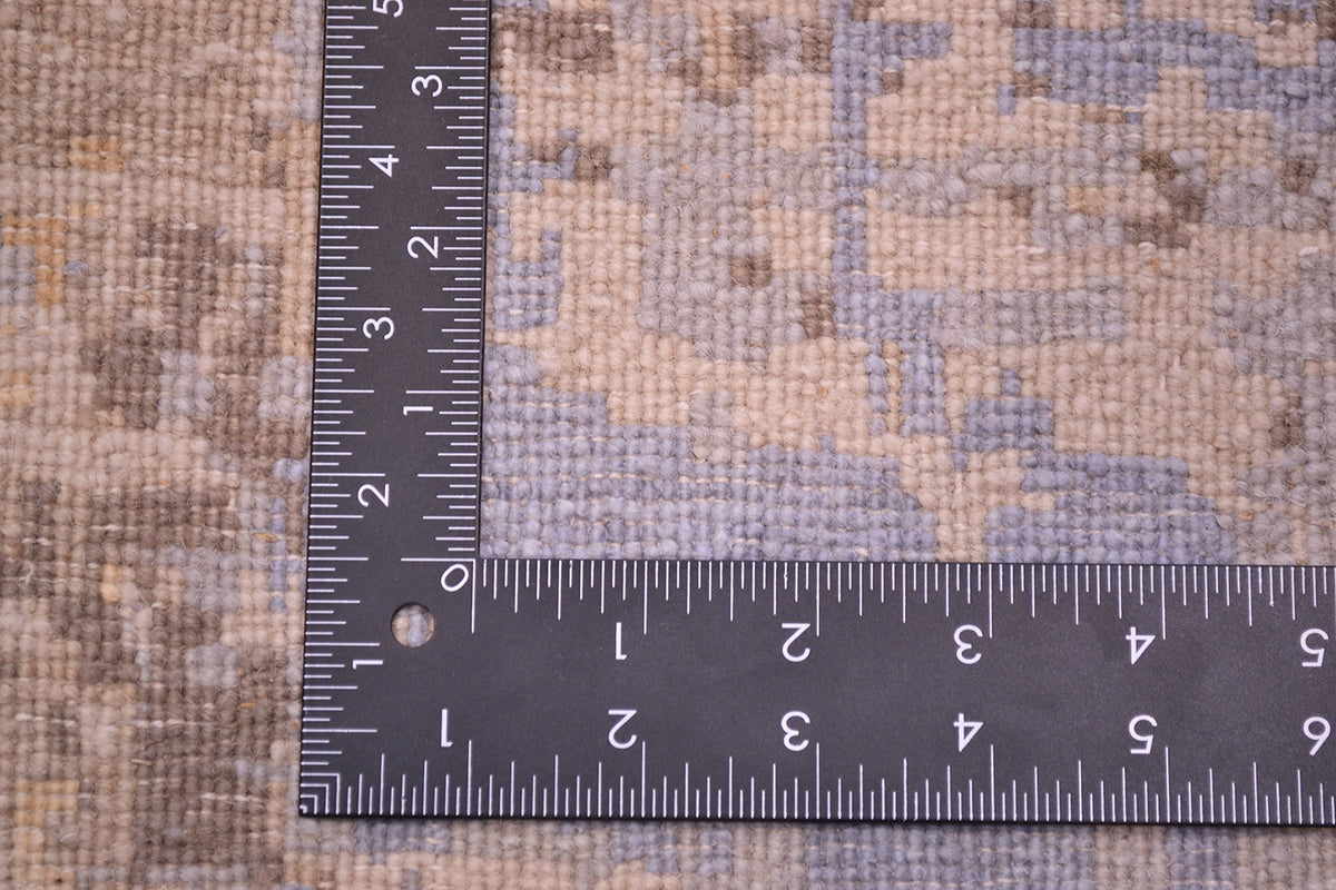 Reverse of handknotted carpet, showing knots ofwool and silk pile. Fineness of weave and stable chrome dyes.