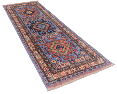 A traditional 2m long Turkmen tribal style runner rug with a blue, red, and beige geometric pattern, shown on a plain white background.
