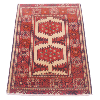 A traditional rectangular area rug mat with a red and beige geometric pattern, featuring a central field with diamond motifs and a patterned border.