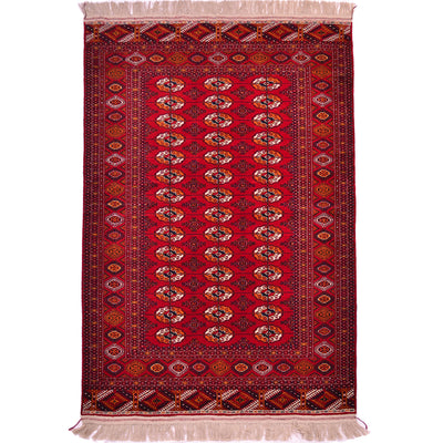 Turkoman Bokhara red rug with all over design of 42 Bokhara guls.