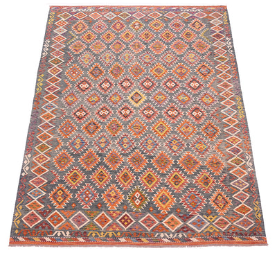 A rectangular Large Afghan green Kilim with a traditional geometric kilim pattern, featuring a green background with orange, red, yellow, and white diamond motifs and a decorative border.
