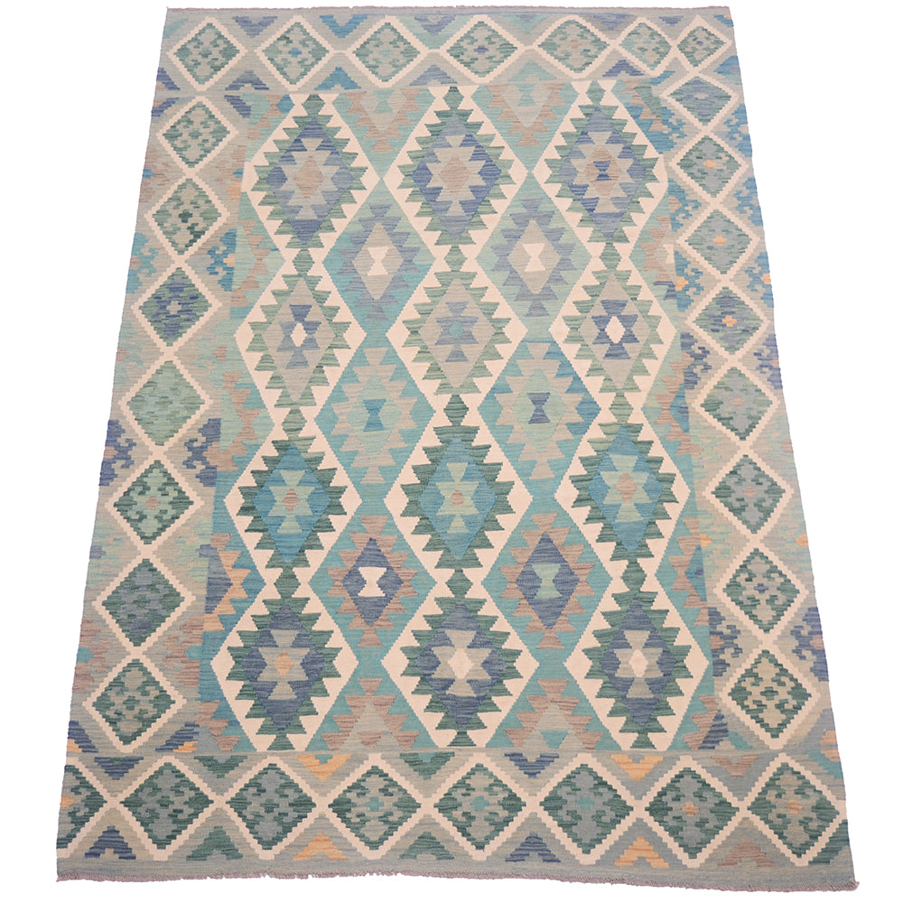 A flatweave Afghan Kilim rug with green shades and blue, teal, beige, and grey, shown flat against a white background.