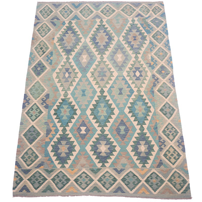 A flatweave Afghan Kilim rug with green shades and blue, teal, beige, and grey, shown flat against a white background.