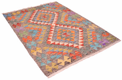 A rectangular small Afghan handwoven Kilim Rug with a geometric diamond pattern in orange, red, blue, yellow, and purple on a salt and pepper background, shown on a plain white background.