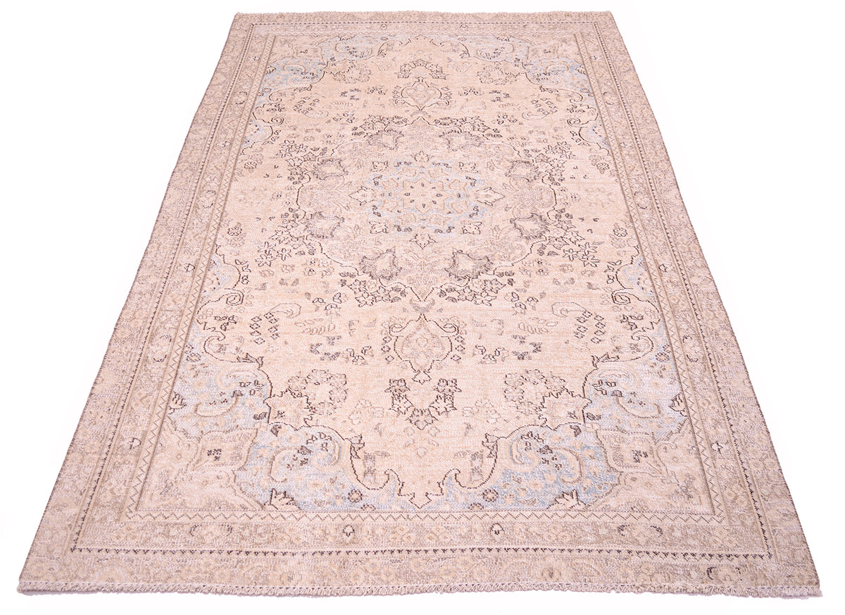 Overall view of vintage oriental carpet with medallion floral design with hint of powder blue in sprandrels with shaved pile on cotton warp foundation. Floral sprays and pendanted medallion with ornaate border.