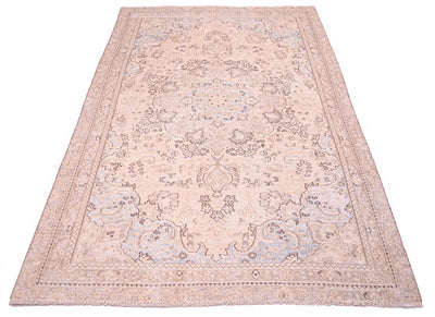 Overall view of vintage oriental carpet with medallion floral design with hint of powder blue in sprandrels with shaved pile on cotton warp foundation. Floral sprays and pendanted medallion with ornaate border.