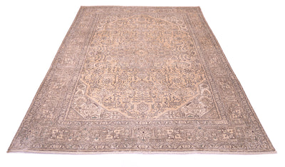 ALl over view of vintage Orietnal handmade carpet with gorudn colour of gold beigh with border base colour of light brown with hints of sage green. Floral geometric pattern outlined in chestnut brown.