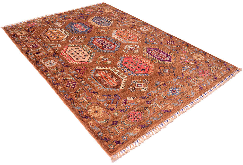 A rectangular traditional brown Afghan Waziri rug with a warm brown base and an intricate multicolour geometric pattern, shown from an elevated angle on a white background.