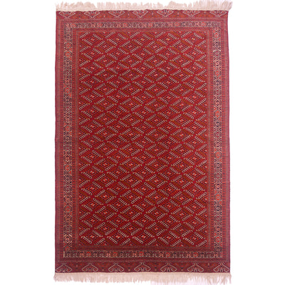 Old Turkoman Yamoud carpet with all over design of “dyrnak” guls on a red field.