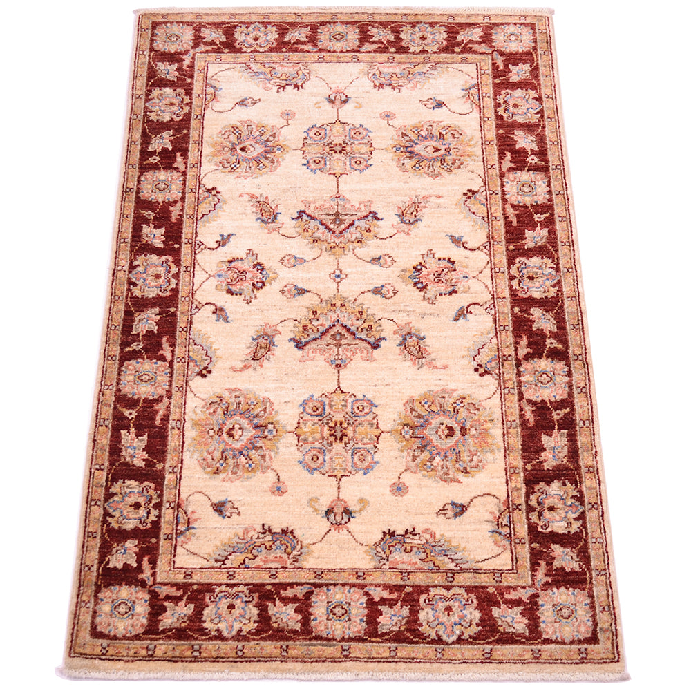 All over floral design handknotted  Afghan Rug with rust red and cream ivory colourways.