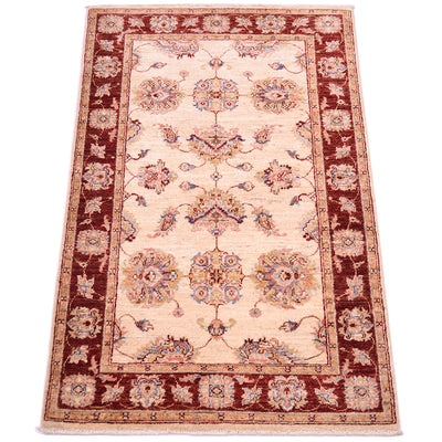 All over floral design handknotted  Afghan Rug with rust red and cream ivory colourways.