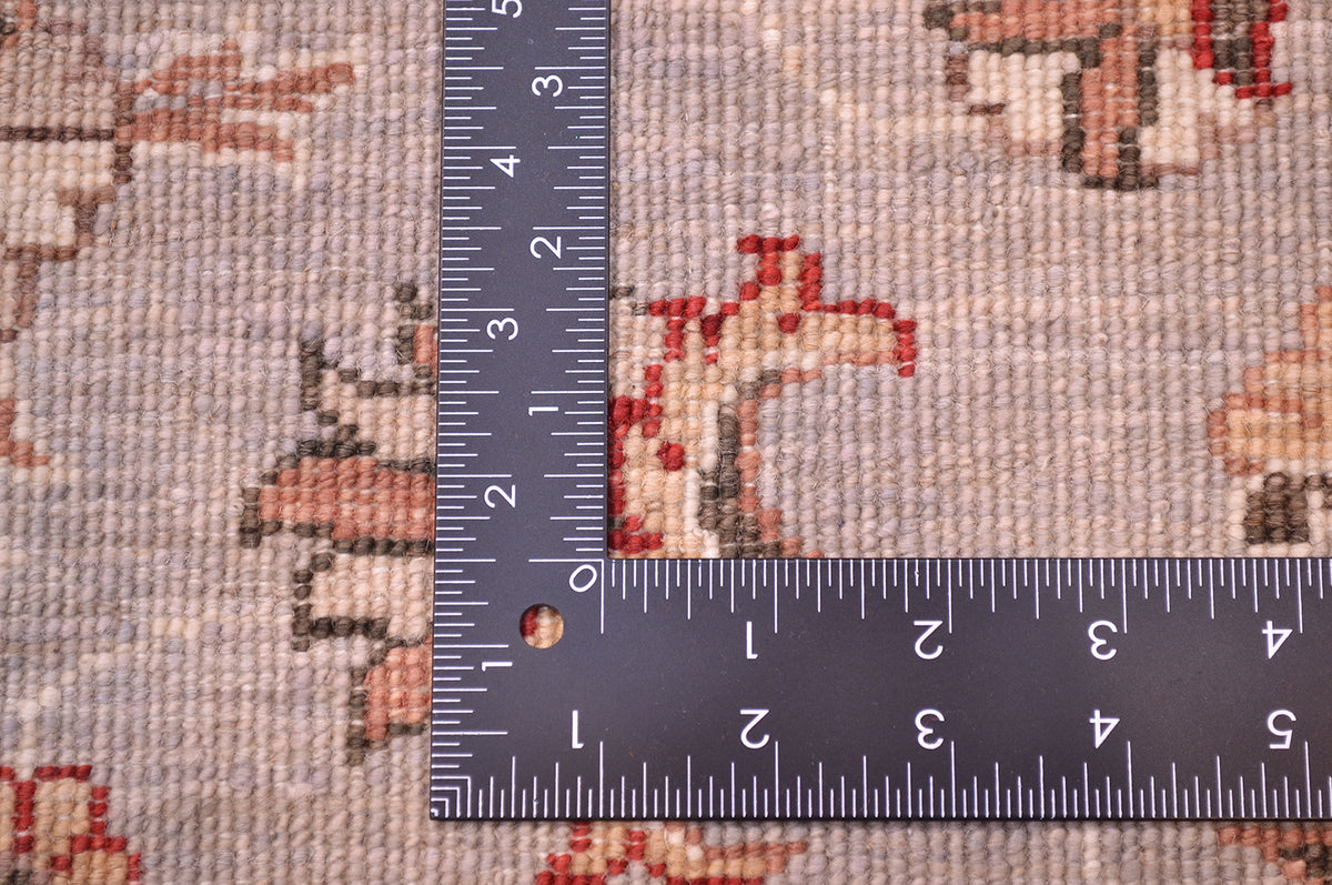 Detials showing reverse of rug and back of knotted pile with natural vegetable dyes.