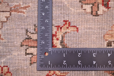 Detials showing reverse of rug and back of knotted pile with natural vegetable dyes.