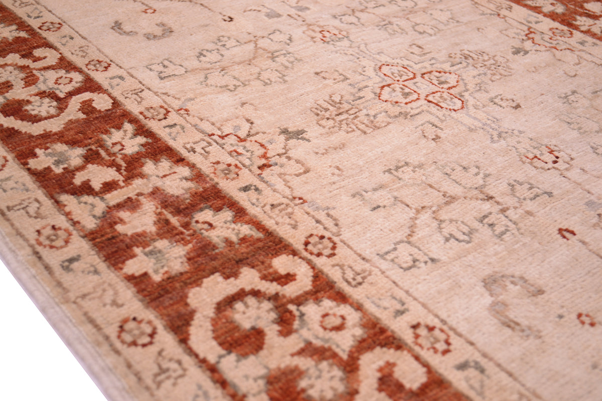 Border of handknotted rust and cream ziegler short runner strip with pure wool pile