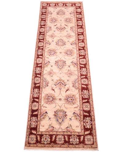 Classic design of  Hanknotted Afghan Ziegler Runner with palmette filled cream beige main field and decorative border.