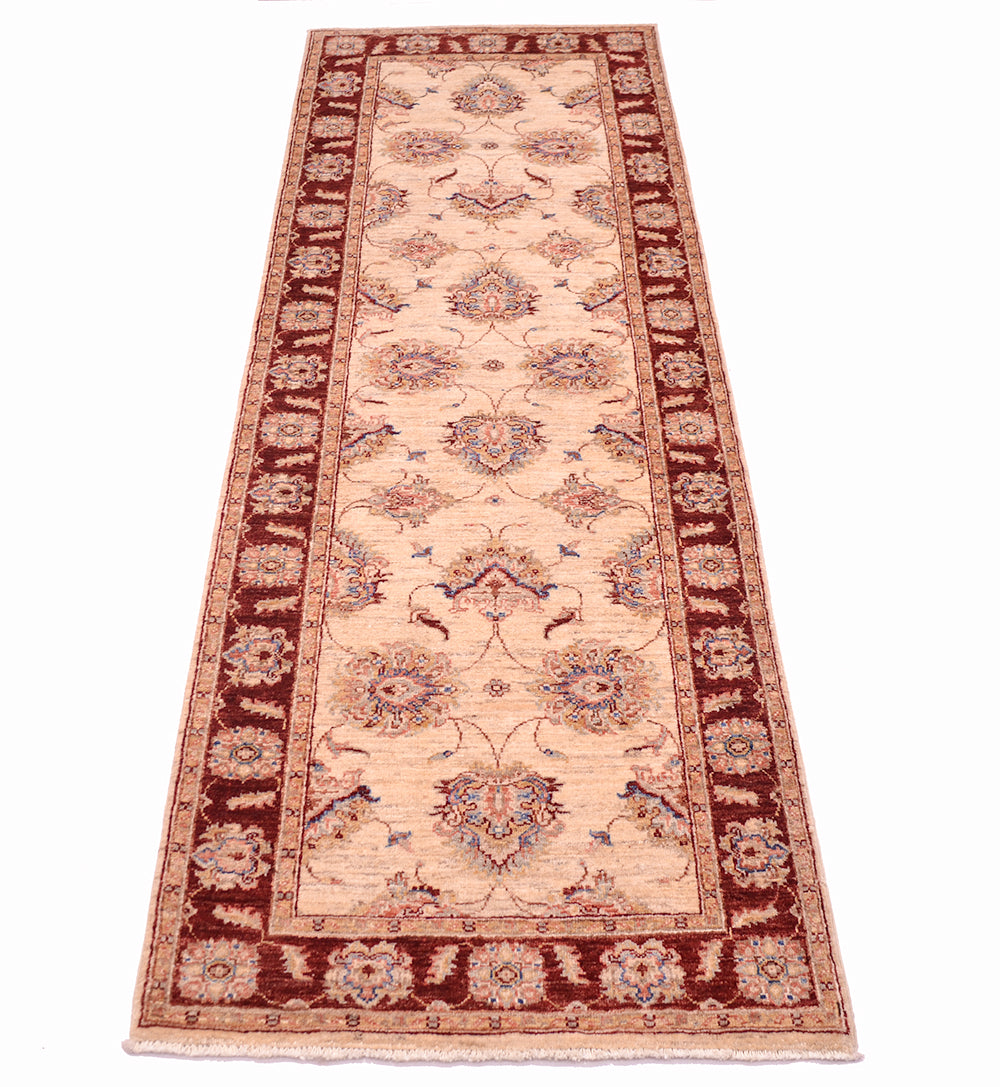  Warm ivory floral field of Afghan Ziegler runner with palmettes with pink and blue detailing. Border background in rich red rust tones with golden hued minor borders.
