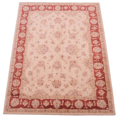 Handmade  Carpet with all over floral design with cream beige main field palmette and floral. Red border background.