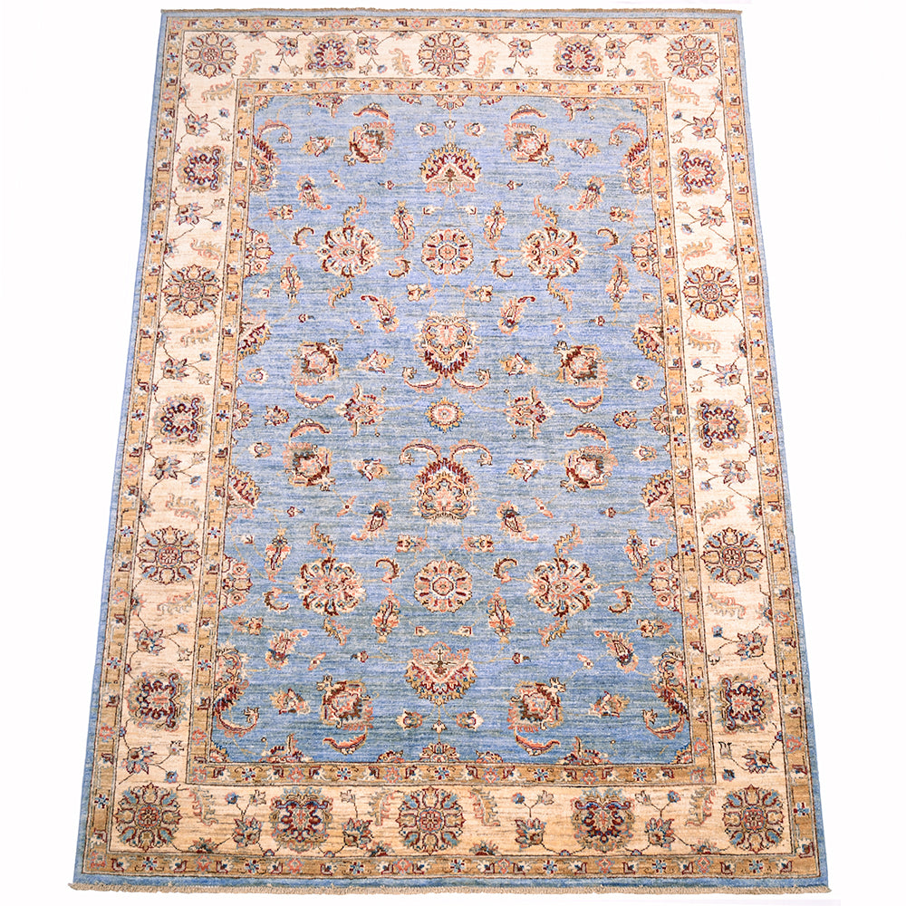 Floral design Ziegler design carpet with palmettes, leaves and petaisl with blue field and cream border.