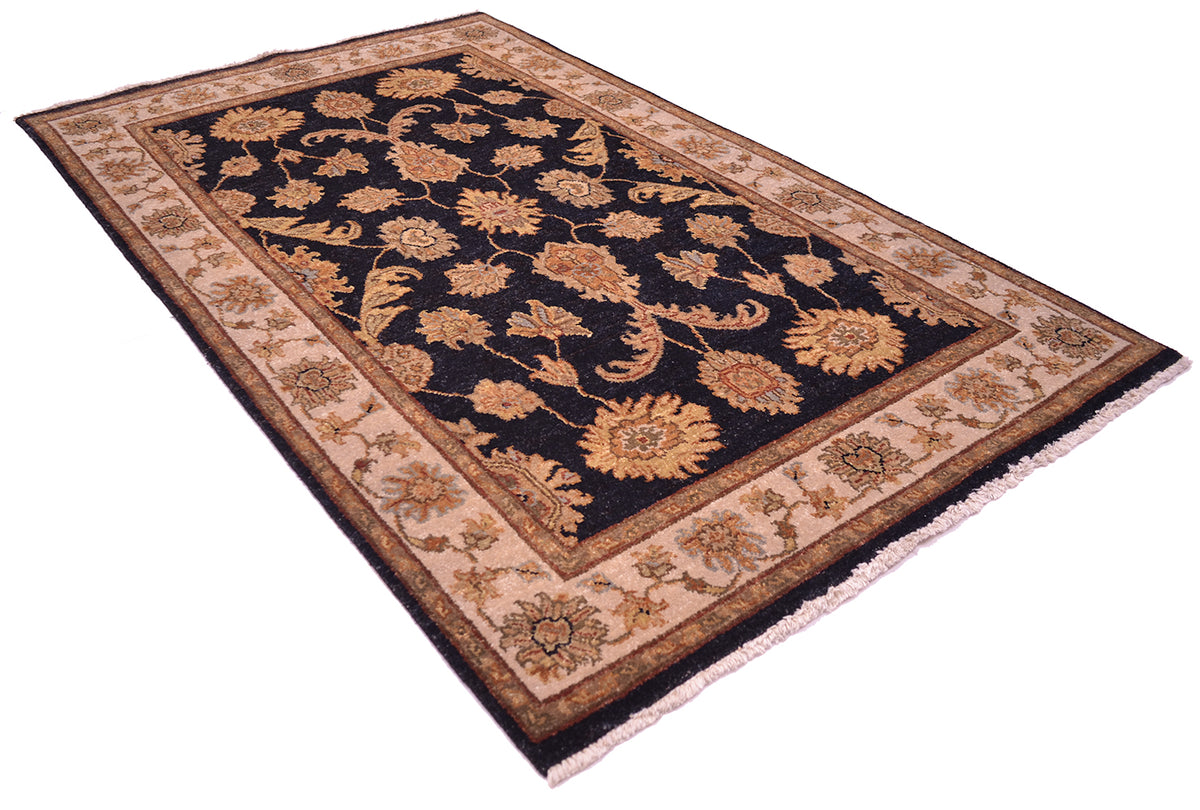 Floral area rug, navy and tan with rust-gold border and symmetrical vine patterns
